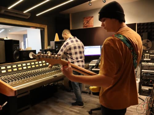 Student recording guitar