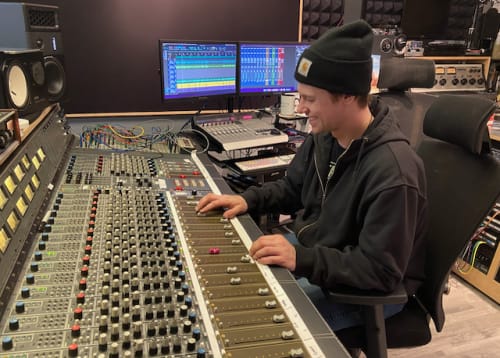 Student at the recording console
